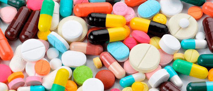 Pílulas e comprimidos coloridos - Medicamento genérico